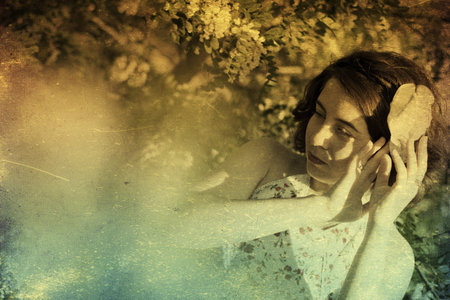 art portrait with beautiful young woman, vintage textureの写真素材