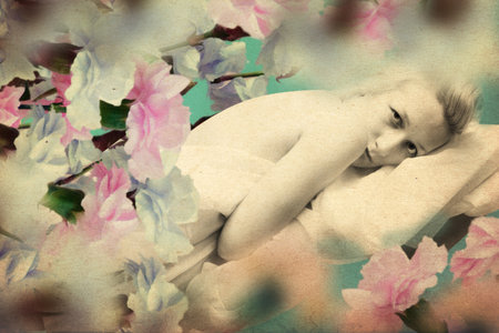 art collage with very beautiful woman in flowersの写真素材