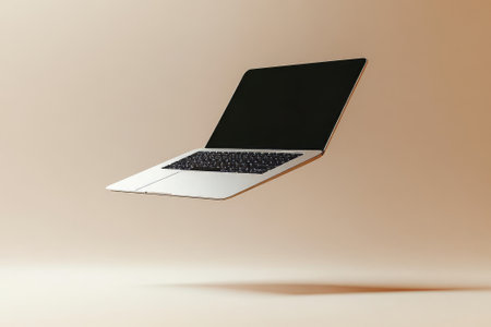 A laptop elegantly floats, symbolizing the fusion of creativity and technology in a minimalist setting, inspiring innovation.の素材