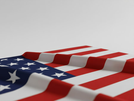 The close up view highlights the rich colors and textures of the American flag, displaying its iconic design with bold red and white stripes and a blue field of stars.の素材