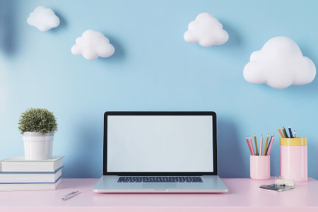 A cheerful workspace showcases a laptop on a pink desk, complemented by a pastel blue wall adorned with whimsical cloud decor.の素材