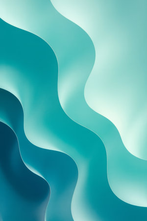 Curved layers of teal and blue flow seamlessly into each other, creating a soothing abstract design. This artwork is ideal for promoting relaxation and artistic inspiration.の素材
