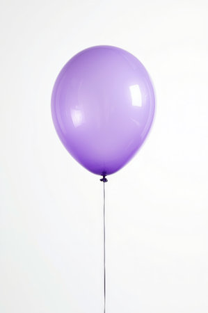 A vibrant purple balloon floats gently in a bright, empty environment. The simplicity of the scene creates a sense of peace and freedom, highlighting the balloon's cheerful color.の素材