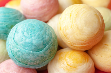 Chinese ancient dessert called 'Pia',ancient dessert Made from flour to Baking heat Mashed golden beans stuffed with salted egg yolk,Chinese pastry, Traditional delicious moon cake in asia,pastel colorの写真素材