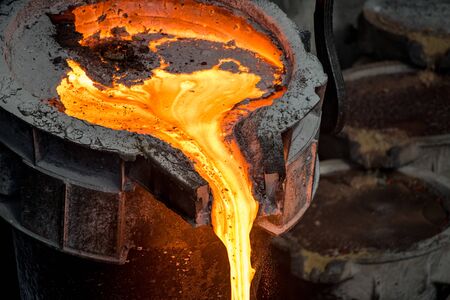 Tank pours liquid metal at the steel mill