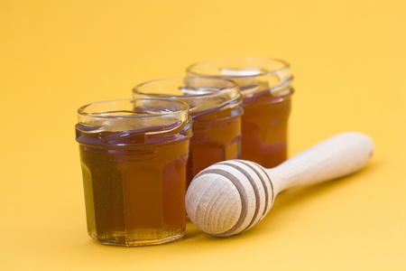 honey and wooden drizzlerの写真素材