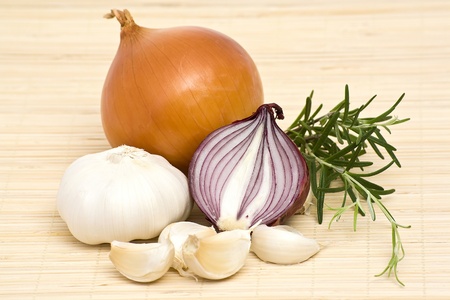 garlic, onion and rosemaryの写真素材