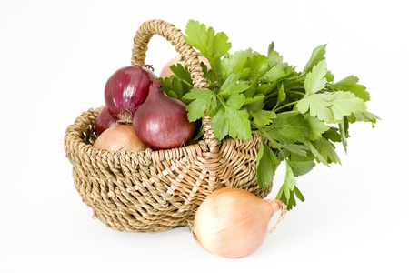 parsley and onion in the basketの写真素材