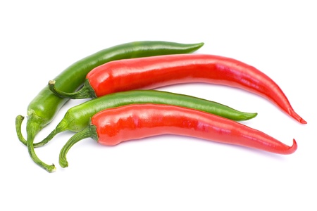 red and green peperoni on whiteの写真素材