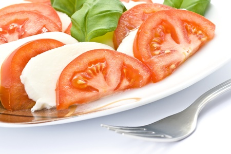 Caprese - Italian salad with tomatos and mozarella cheeseの写真素材