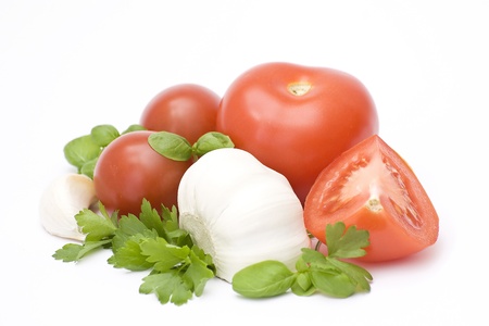 tomatoes, garlic and herbsの写真素材
