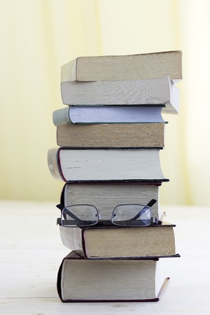 books stack and glassesの写真素材