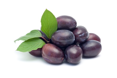 fresh plums isolated on whiteの写真素材