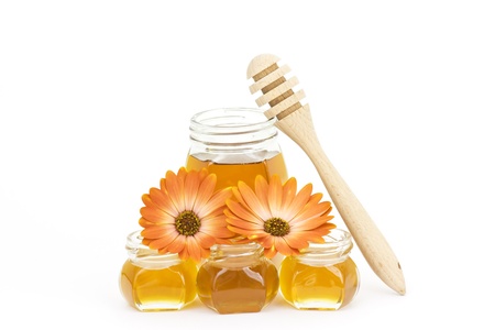 honey and flowers on whiteの写真素材