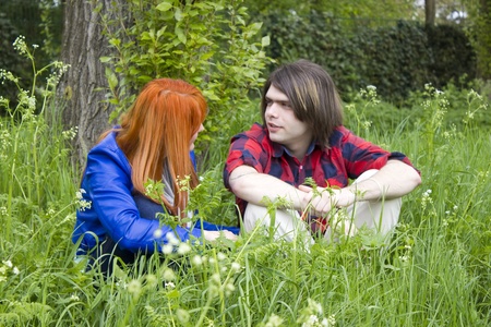 Portrait of love couple outdoor in parkの写真素材