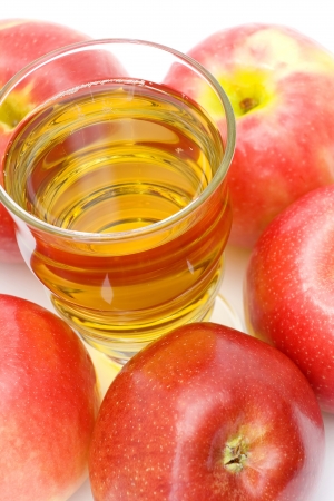 glass of fresh apple juice and fresh fruitsの写真素材