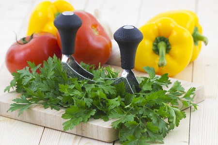 Freshly chopped parsley and vegetablesの写真素材