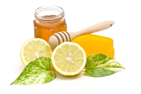 glycerin soap, jar of honey and lemon の写真素材