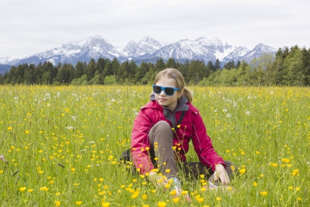 portrait of a girl against the panorama of the Alpsの写真素材