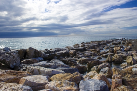 Stone beach in Almunecar, Andalusia, Spainの写真素材