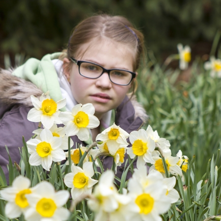 young girl in spring parkの写真素材