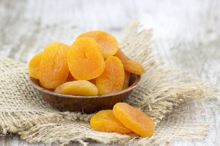 bowl full of dried apricotsの写真素材