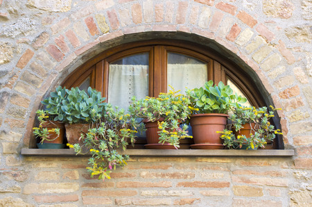 lovely tuscan window, Volterra, Italyの写真素材