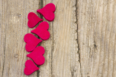 red hearts on wooden backgroundの写真素材