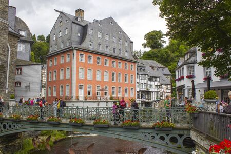 MONSCHAU, GERMANY - JULY 30, 2016: small town Monschau with unidentified people. The historic town center has many half-timbered houses and narrow streets remained nearly unchanged for 300 yearsのeditorial素材