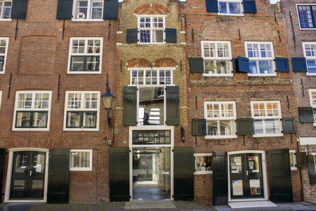 ZIERIKZEE, THE NETHERLANDS - APRIL 11, 2019: Old house in the small city Zierikzee on the former island Schouwen in Zeeland province, the Netherlands.のeditorial素材