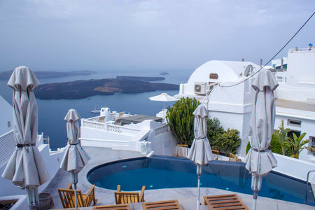 White architecture of Fira (Thira) town on Santorini island in Greece - view of Calderaの写真素材