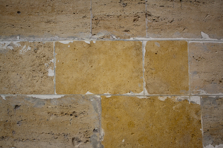 relief texture on the wall of an old buildingの写真素材