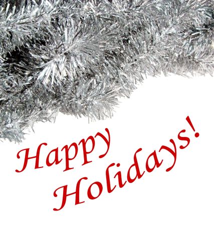 Christmas card: Happy holidays wishes on white background with bright silver garland ornament as a border.の写真素材