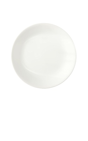 Crisp white porcelain dinner plate isolated on white background, vertical with copy space.の写真素材