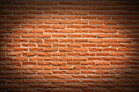 Another great brick wall background, orange terra cotta color, with follow spot highlight making a...