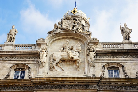 Architectural detail of Lyon, France city hall, with Henry IV on a horse and other statues.のeditorial素材