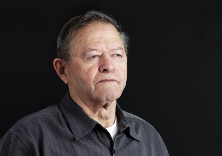 Sad, depressed or deep in thoughts senior old manの写真素材