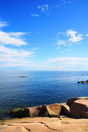 Beautiful sunny day to kayak on calm seaの写真素材
