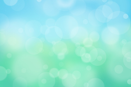 Airy background with bokeh and other lights effect on blue, green, yellow, turquoise background, nature conceptの写真素材