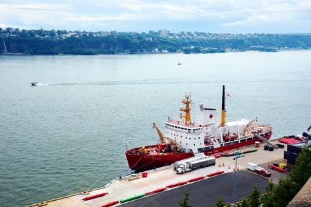 CANADA, QUEBEC CITY- JULY 20, 2014: Canadian coast guard Des Groseillers vessel  on the St.Lawrence, docked in Quebec city. The Coast guard is responsible for 2.3 million square nautical miles (8 million km2).のeditorial素材