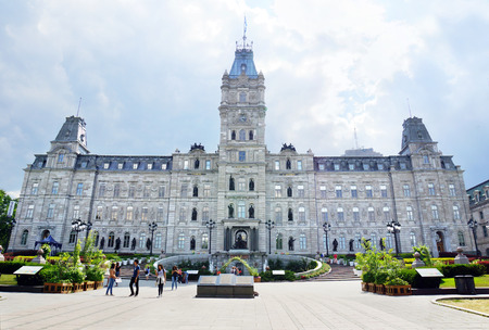 QUEBEC CITY, CANADA - JULY, 20: Tourists in front of the province of Quebec's parliament on July 20, 2014. The 1886 building is located just outside Old Quebec's walls.のeditorial素材