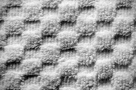 Woven white towel with square pattern, black and white texture and backgroundの写真素材