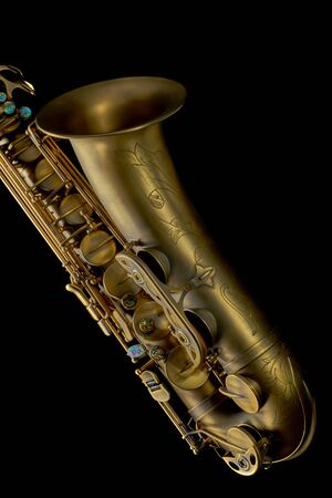 Tenor saxophone close-up on blackの写真素材