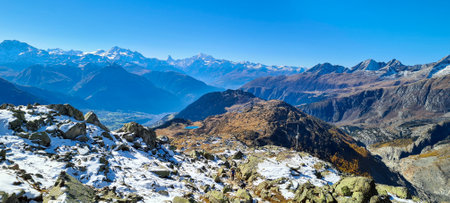 Panoramic view on the snow-capped Alps in Switzerlandの写真素材