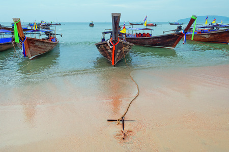 Traditional longtail boats on the Ao Nang beach at morning. Krabi province. Thailand
