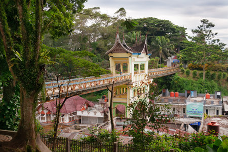BUKITTINGGI, INDONESIA - DEC 22, 2013: Bridge with Minangkabau architecture. Bukittinggi is the second biggest city in West Sumatra,with a population of over 91,000 people. It is located near the volcanoes Mount Singgalangand Mount Marapi. のeditorial素材