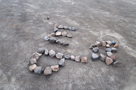 Letters and heart from stone on Volcano Merapii. It is the most active volcano in Sumatra. Indonesiaの写真素材
