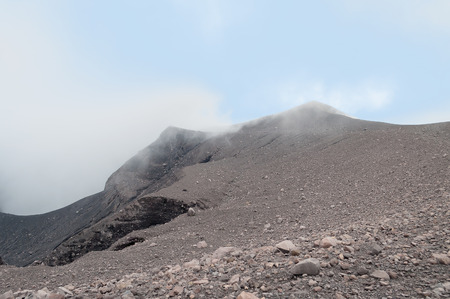  Volcano Merapi in the cloudsi. It is the most active volcano in Sumatra. Indonesia