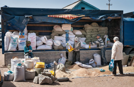 BOSTERI, KYRGYZSTAN - MAY 4, 2014: Sunday market. Bosteri is a village in the Issyk Kul Province of Kyrgyzstan. It is a popular resort village where a lot of hotels, resortのeditorial素材
