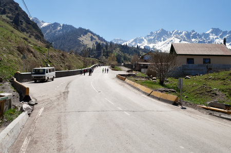 ALMATY, KAZAKHSTAN - MAY 8, 2014: Road to Shymbulak ski resort. It is located in the upper part of the Medeu Valley in the Zaiilisky Alatau mountain range, at the elevation of 2200 meters above sea level.のeditorial素材